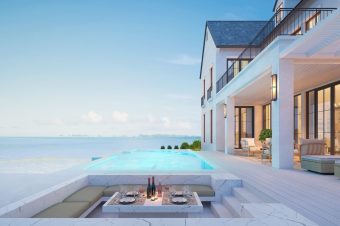 Luxury beach house with sea view swimming pool and terrace at vacation.3d rendering