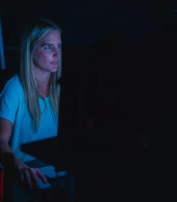 Tabatha Rowbatham working on her computer in Downtown New York City