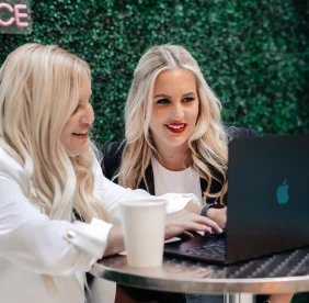 Tiffany Coyle & Tab Row working in NYC